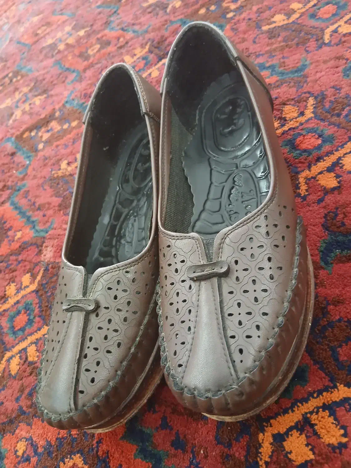 کفش زنانه|کیف، کفش، کمربند|رشت, فلسطین|دیوار