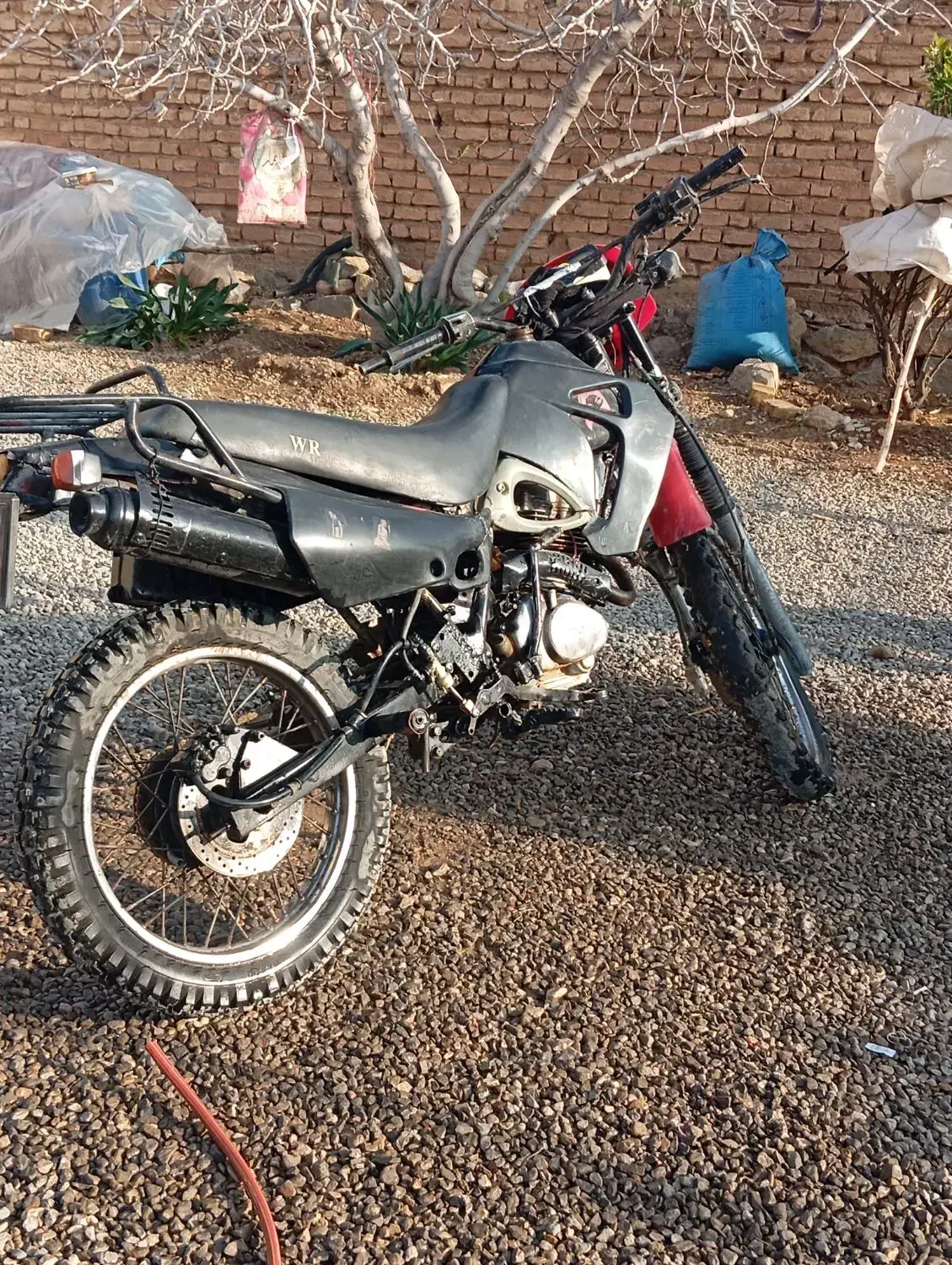 برای تو حضیات زنگ بزنید|موتورسیکلت|مرودشت, نقش رستم|دیوار