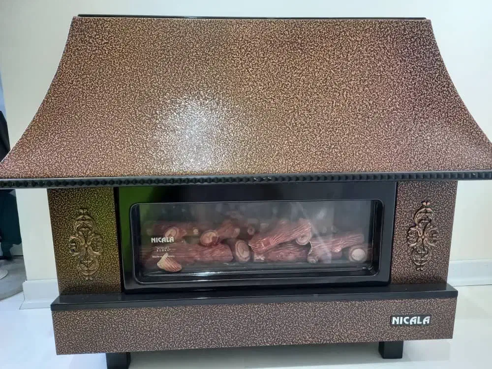 بخاری طرح شومینه ۲۸ هزار نیک کالا  سالم|بخاری، هیتر، شومینه|شاهین‌شهر, طالقانی|دیوار