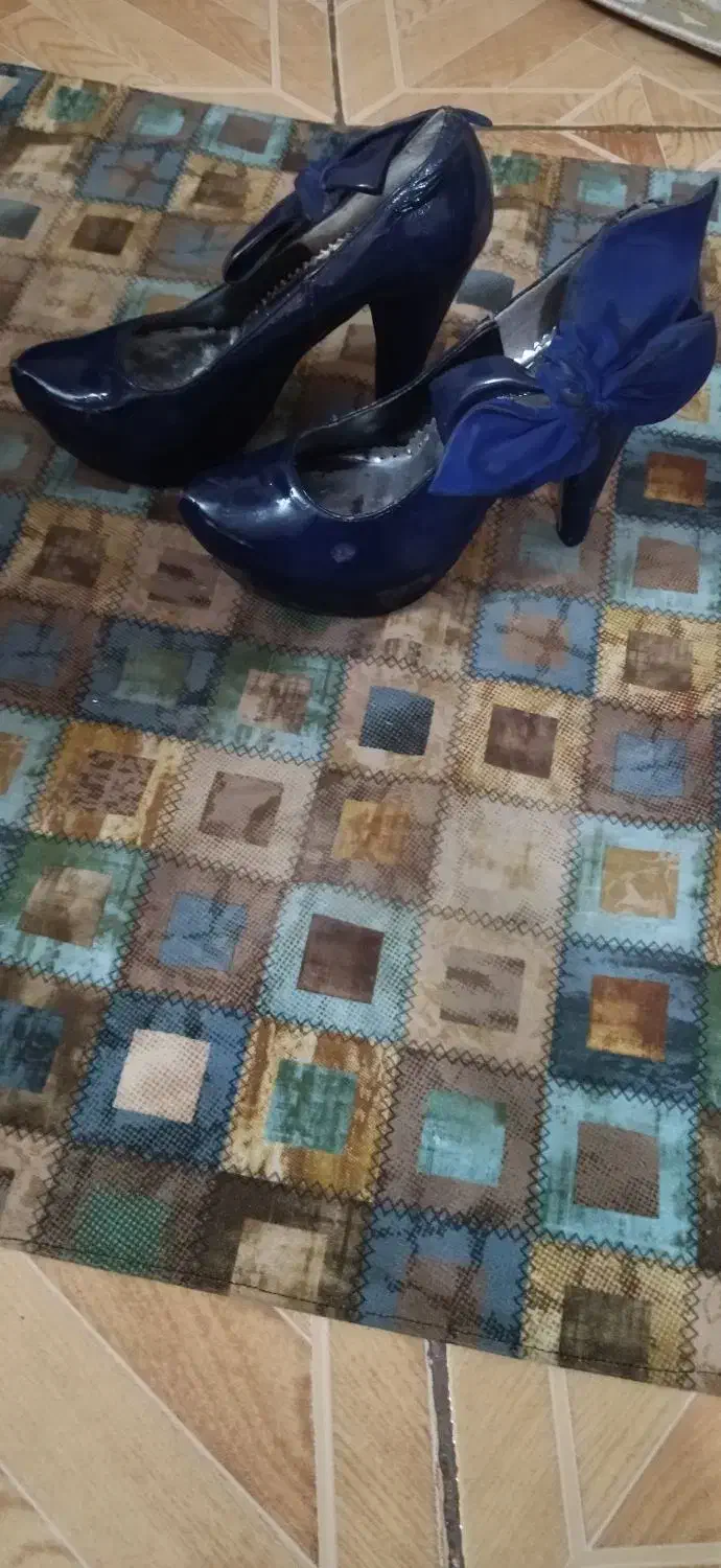 کفش|کیف، کفش، کمربند|شهریار, شهریار|دیوار