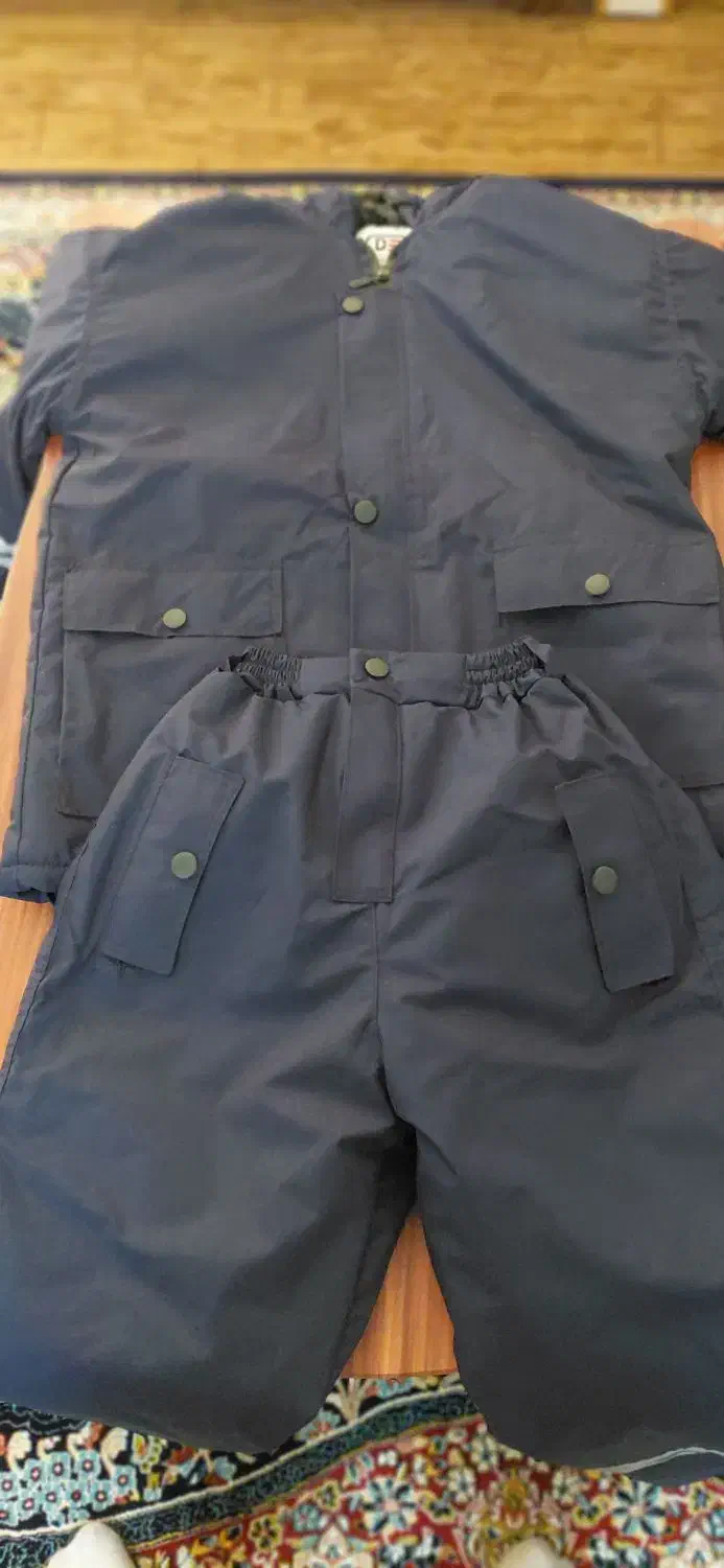 بادگیر وپوتین کار|لباس|هشتگرد, شهرک بعثت|دیوار