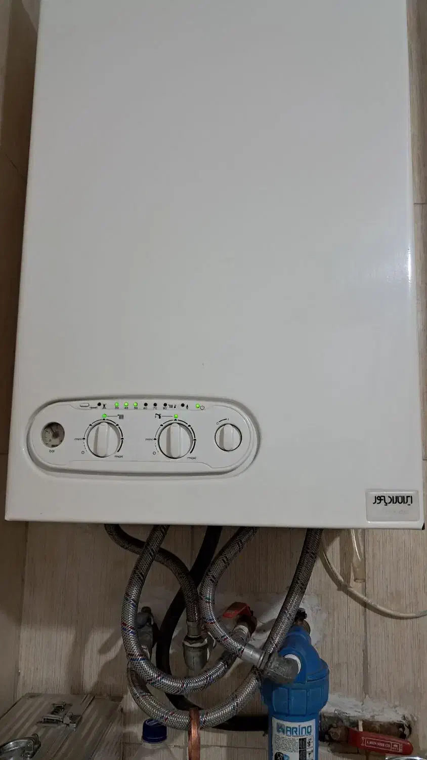 تاسیسات فنی خالقی پکیج آبگرمکن تانکر|خدمات پیشه و مهارت|پیشوا, |دیوار