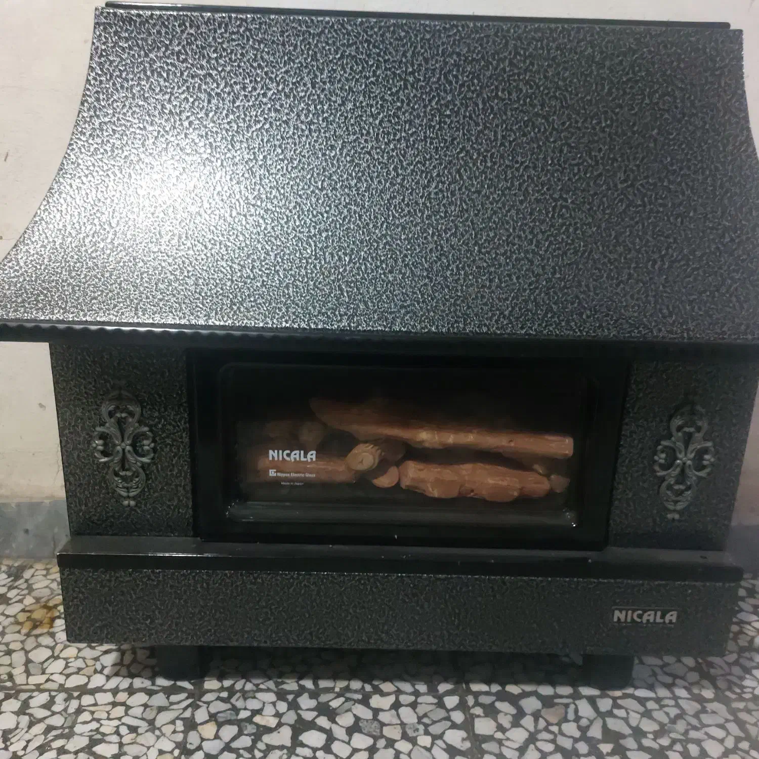 بخاری طرح شومینه ۱۸ هزار نیک کالا در حد نو|بخاری، هیتر، شومینه|صومعه‌سرا, |دیوار