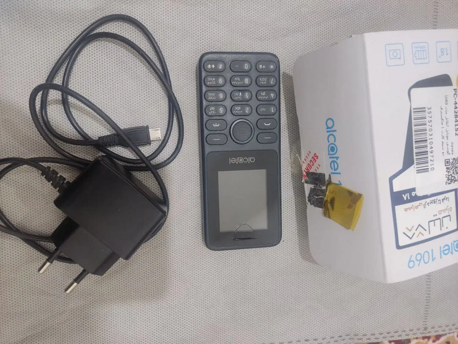 گوشی alcatel ۱۰۶۹|موبایل|بندر دیر, |دیوار