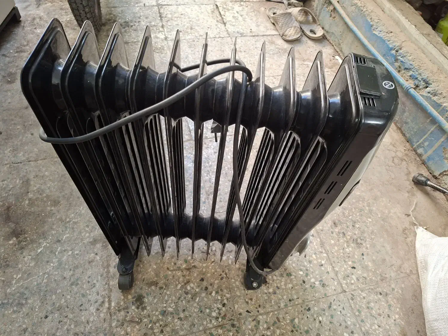 بخاری برقی روغنی|بخاری، هیتر، شومینه|قم, هفت تیر|دیوار