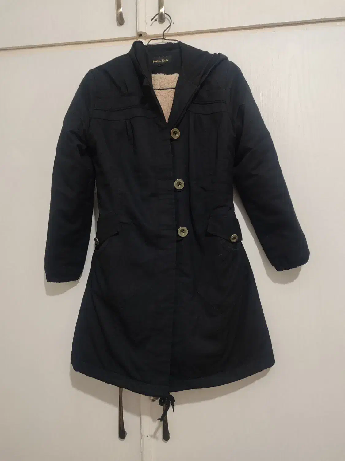 کاپشن|لباس|گرگان, |دیوار