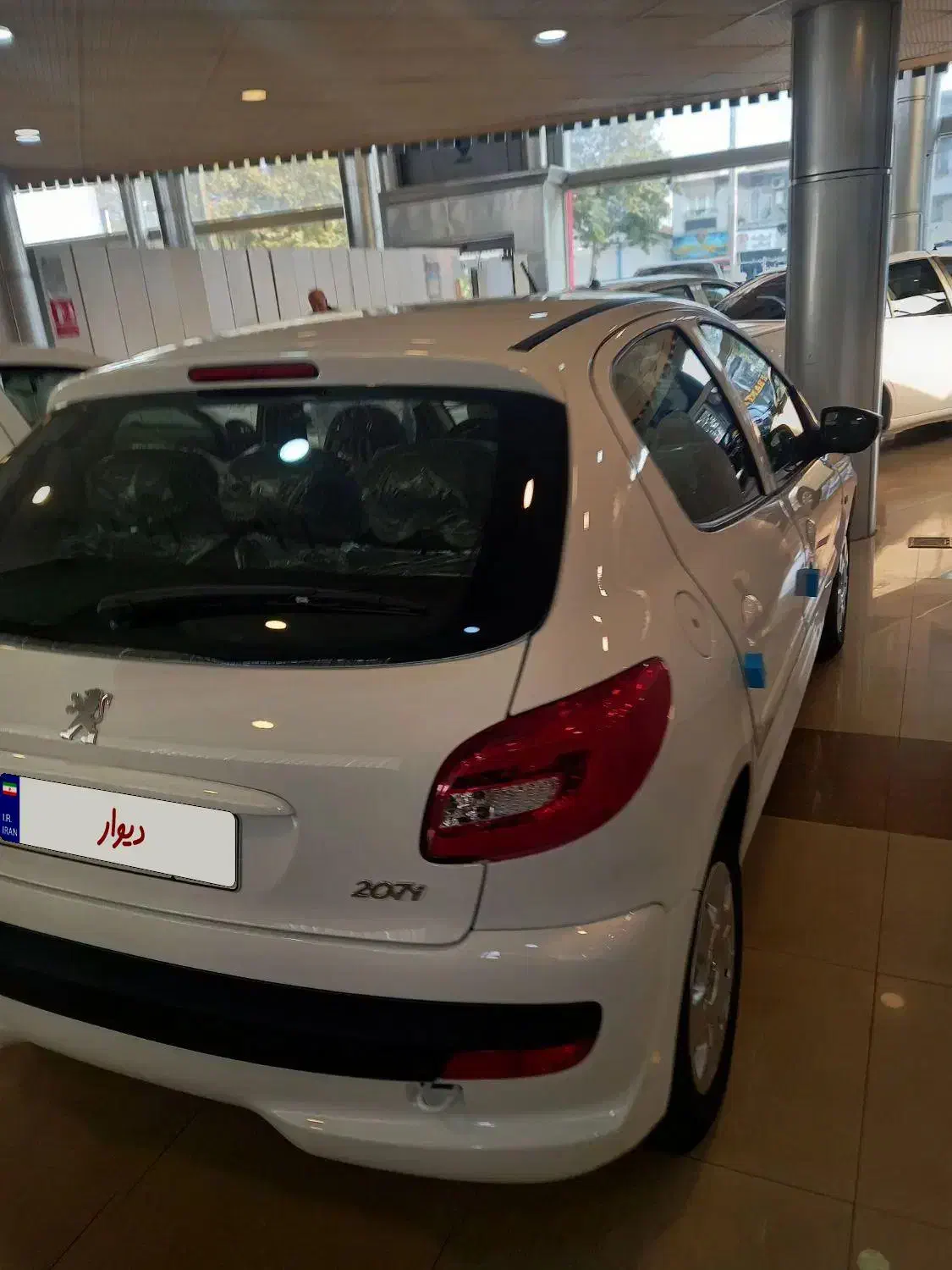 ۲۰۷ تیوفایو  ارتقاع یافته صفر خشک|خودرو سواری و وانت|رشت, هلال احمر|دیوار