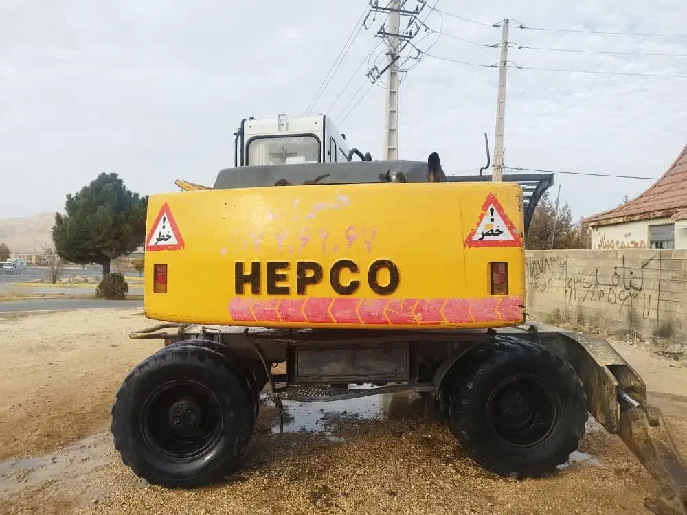 بیل میکانیکی چرخ لاستیکی|خودرو سنگین|بومهن, |دیوار