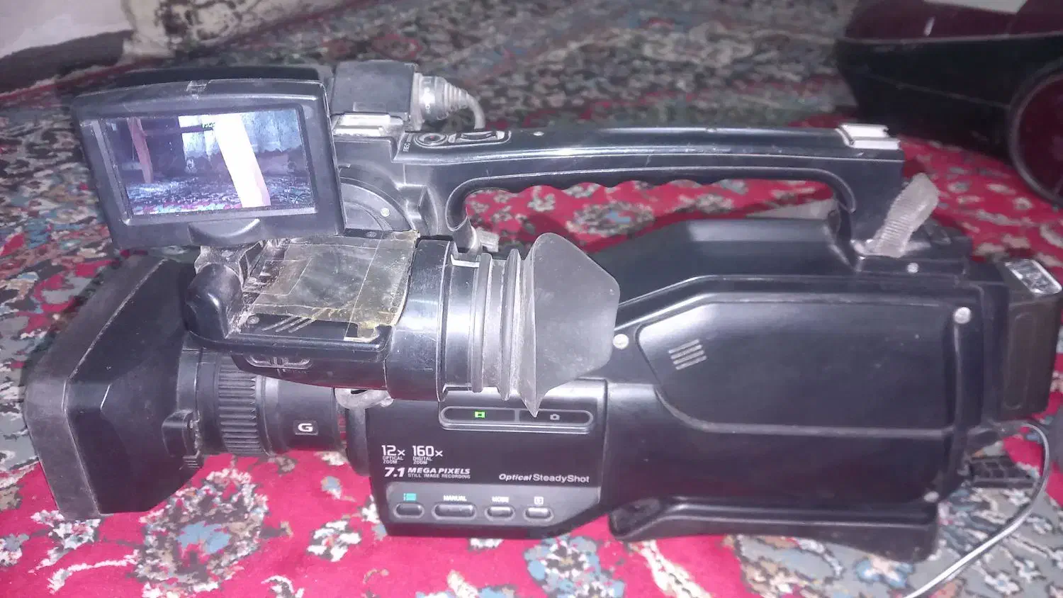 دوربین فیلمبرداری حرفه ای  سونی|دوربین عکاسی و فیلم‌برداری|گلوگاه بابل (گلیا), |دیوار