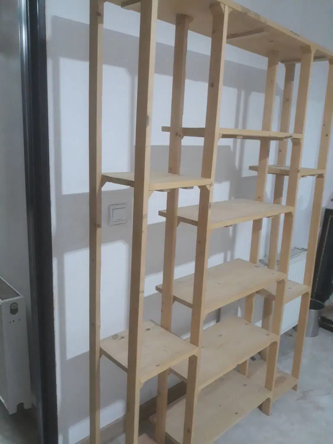 رگال|کتابخانه، شلف، قفسه‌های دیواری|قدس, شهر‌قدس|دیوار