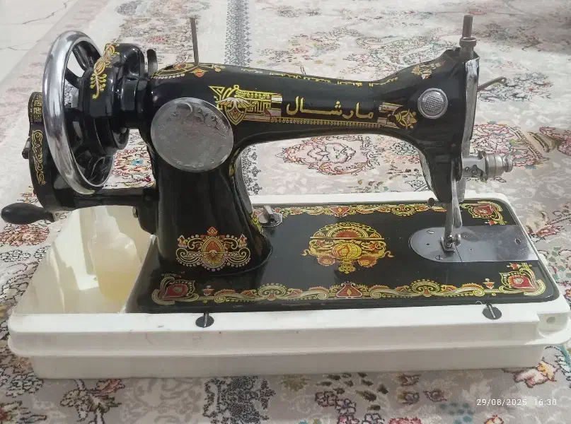 چرخ مارشال|چرخ خیاطی و ریسندگی|شیراز, کوشک میدان|دیوار