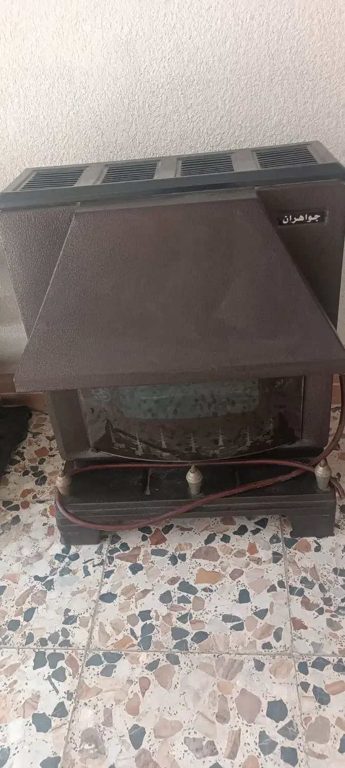 بخاری شومینه ای کاملا سالم مارک جواهران|بخاری، هیتر، شومینه|رشت, آزادگان|دیوار