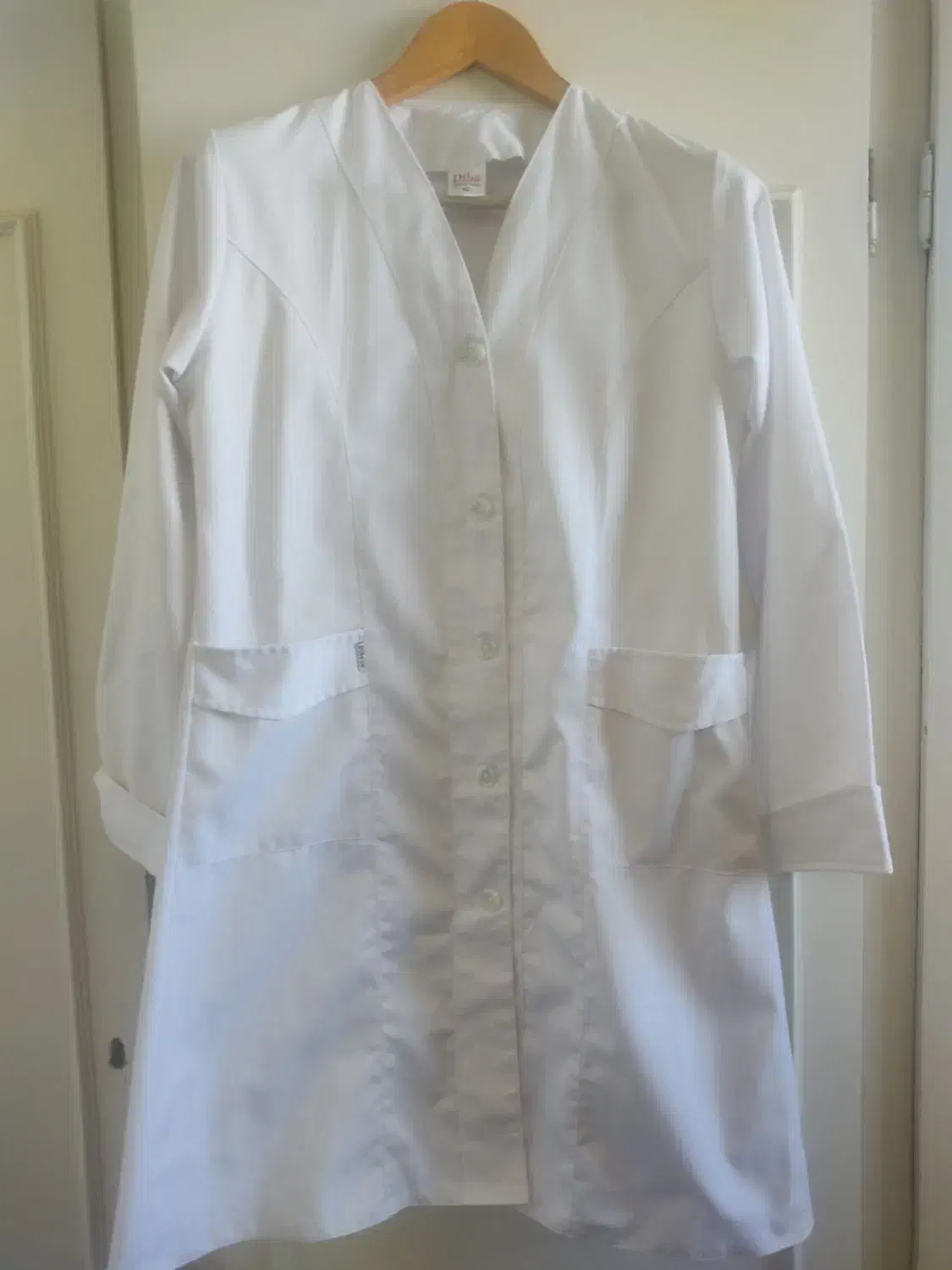 روپوش سفید|لباس|نیشابور, بنیاد شهید|دیوار