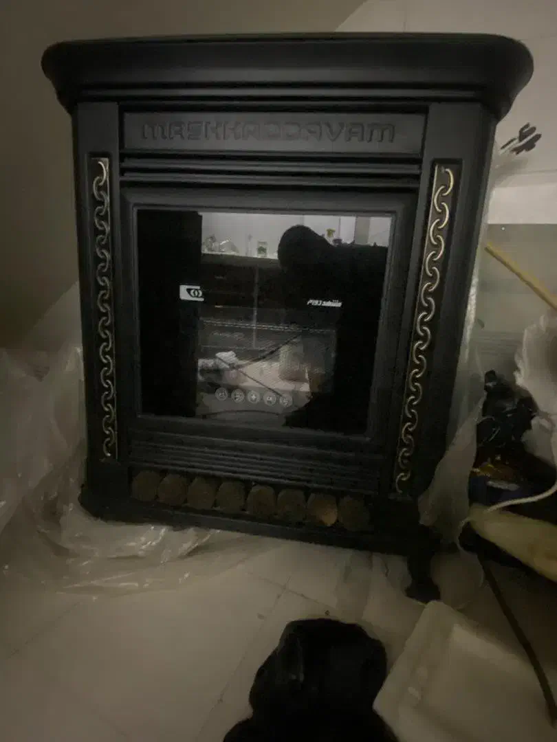 بخاری طرح شومینه مشهد دوام|بخاری، هیتر، شومینه|شیراز, کوشک میدان|دیوار