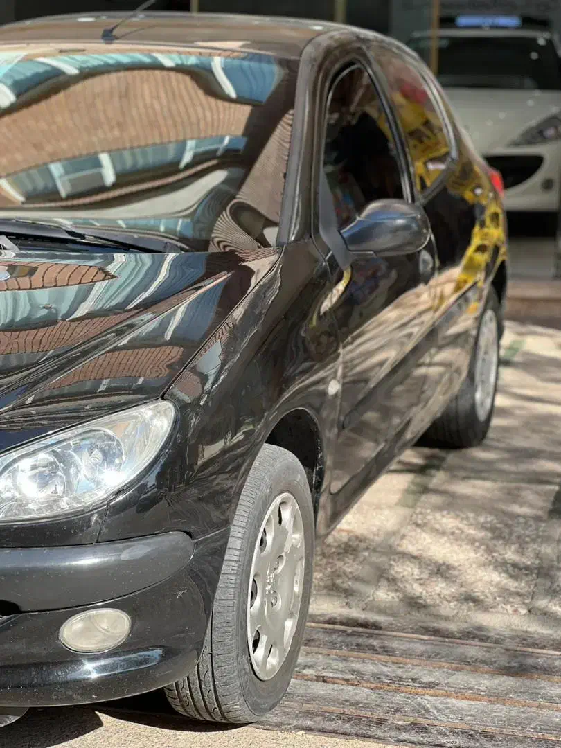 پژو ۲۰۶ مدل ۱۴۰۰ مشکی|خودرو سواری و وانت|قم, سعادتی|دیوار