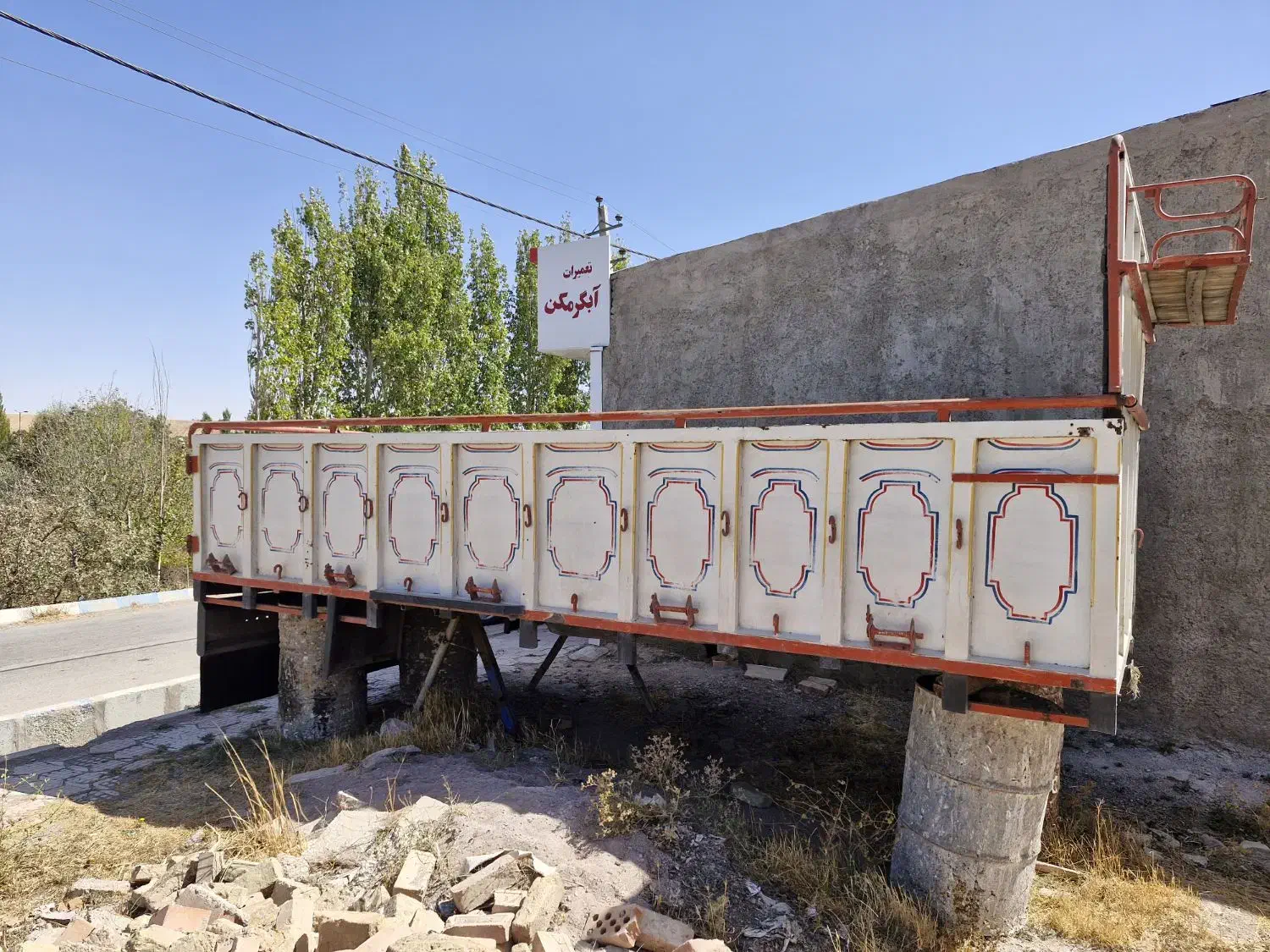 اتاق عقب اسیوزو|خودرو سنگین|الوند, |دیوار