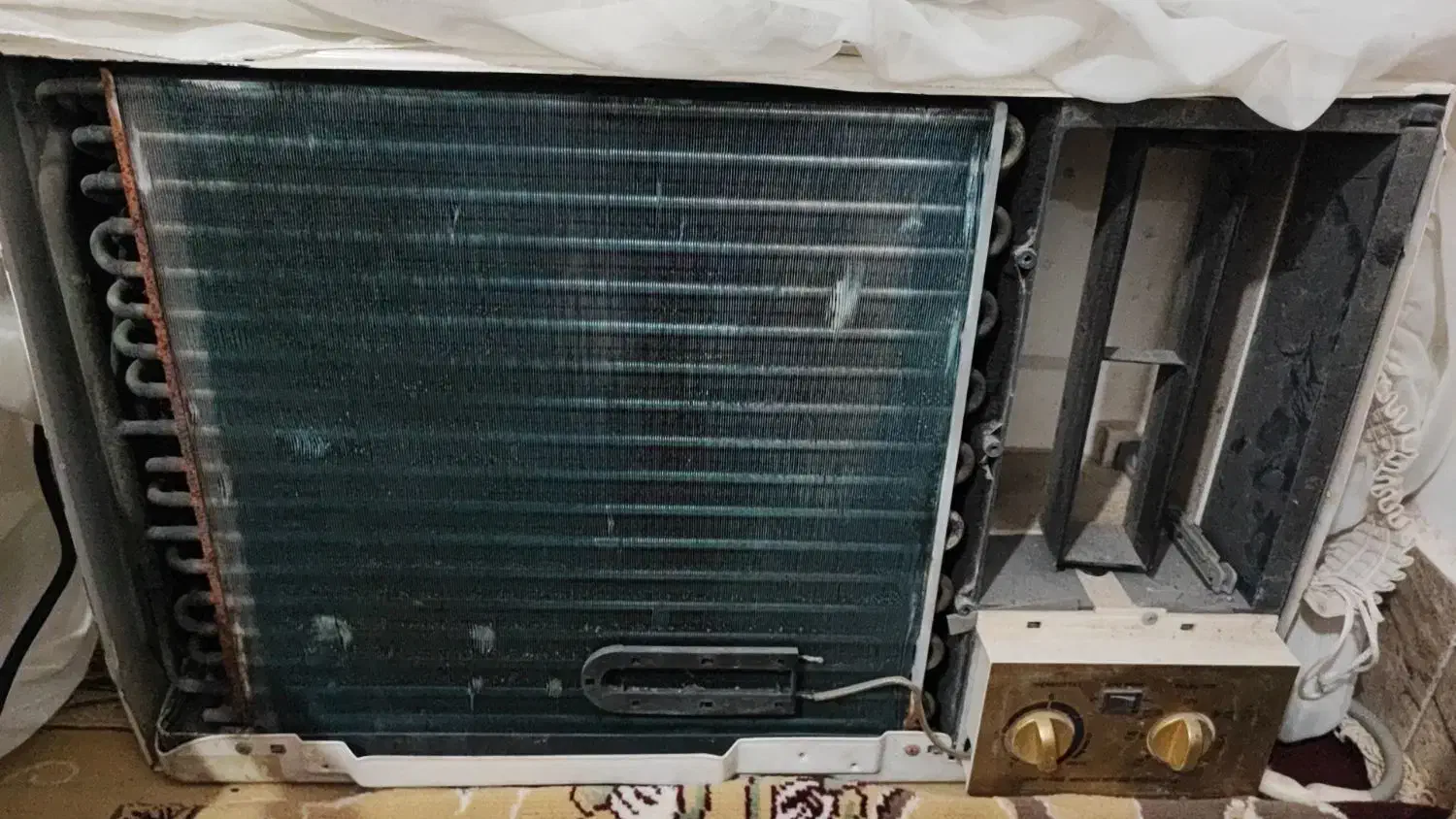 کولر پنجره ای|کولر گازی و فن‌کوئل|هندیجان, |دیوار