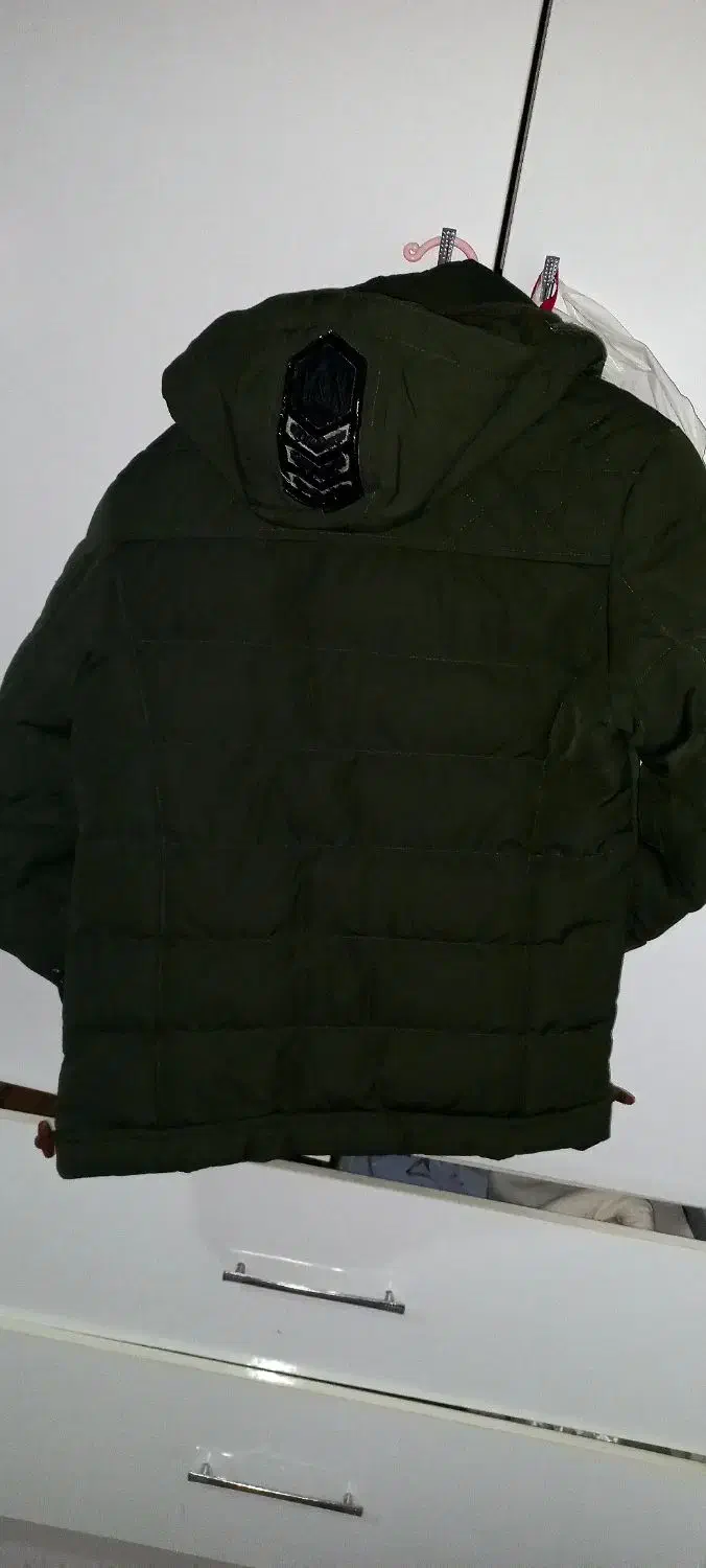 کاپشن|لباس|تبریز, |دیوار