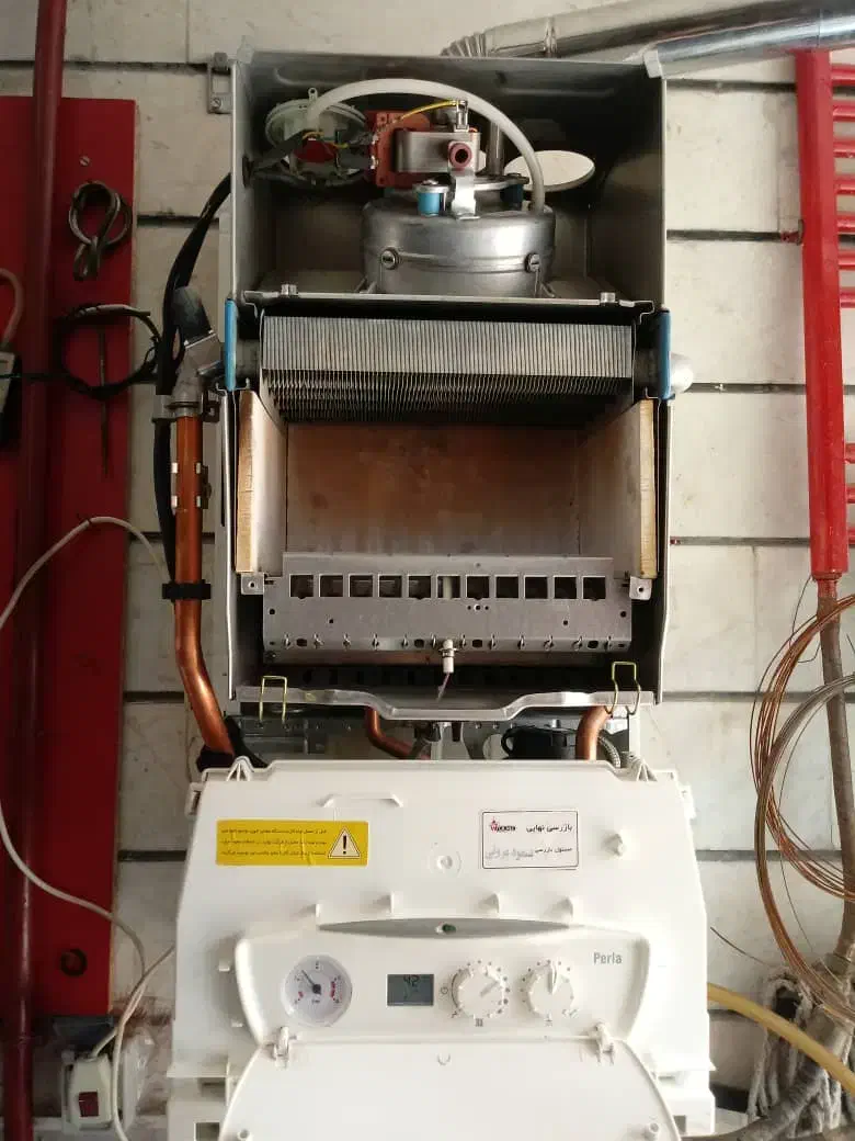 تعمیرات پکیج آبگرمکن بخاری کولر شومینه|خدمات پیشه و مهارت|قزوین, |دیوار