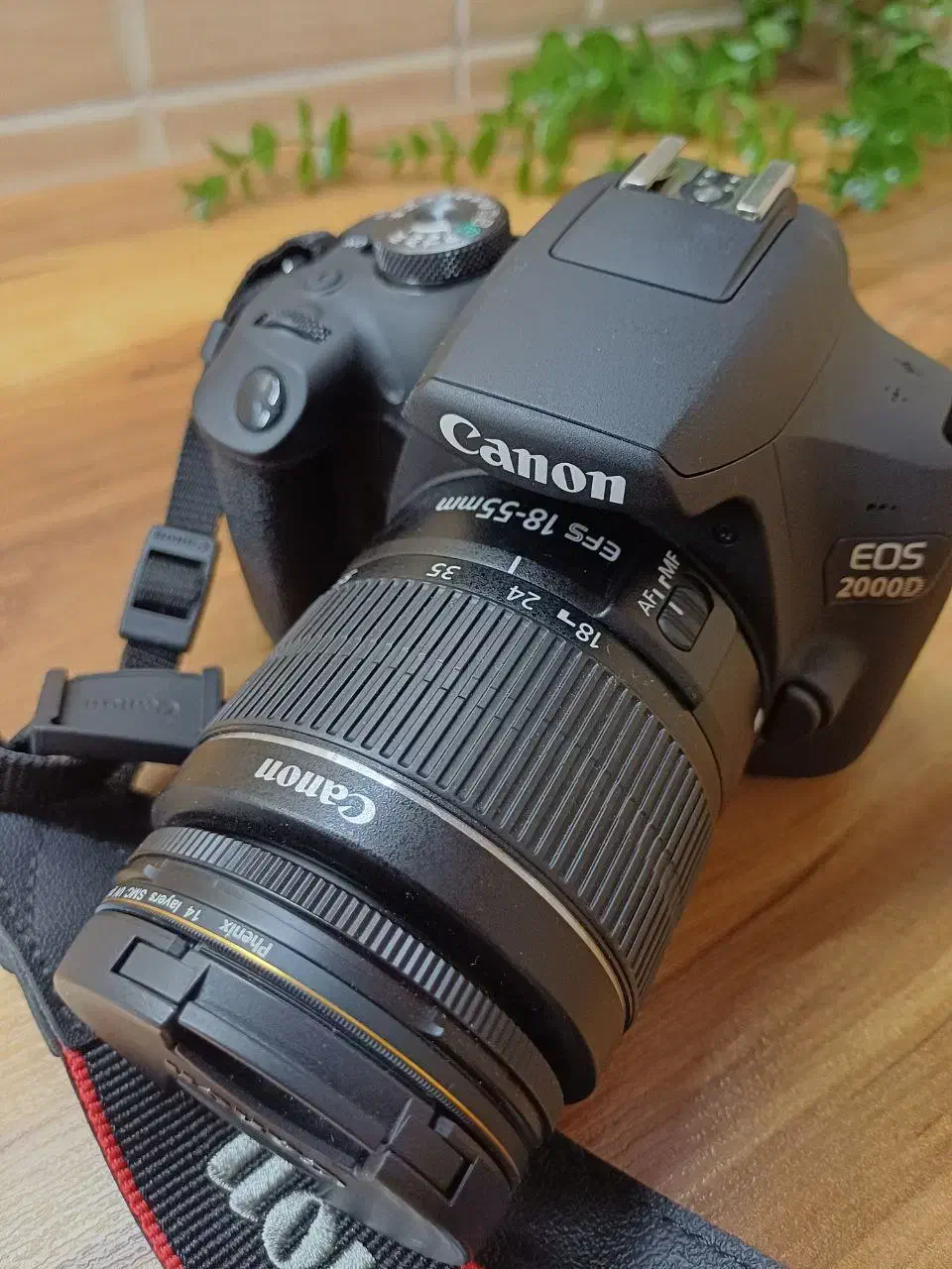 دوربین کنون 2000d همراه با لنز 18-55|دوربین عکاسی و فیلم‌برداری|کرج, شهرک جهان‌نما|دیوار