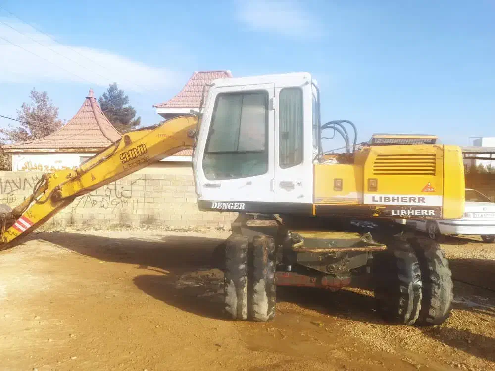 بیل میکانیکی چرخ لاستیکی|خودرو سنگین|بومهن, |دیوار