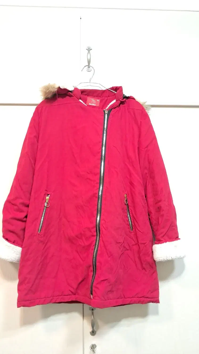 کاپشن|لباس|قم, چهار مردان|دیوار