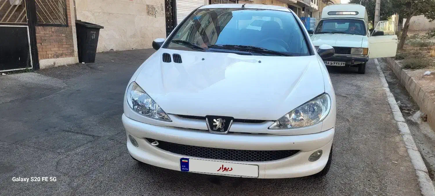 پژو 206 SD. V8 سفارشی مدل۹۰ سفیدتمیز|خودرو سواری و وانت|شیراز, قالیشویی|دیوار