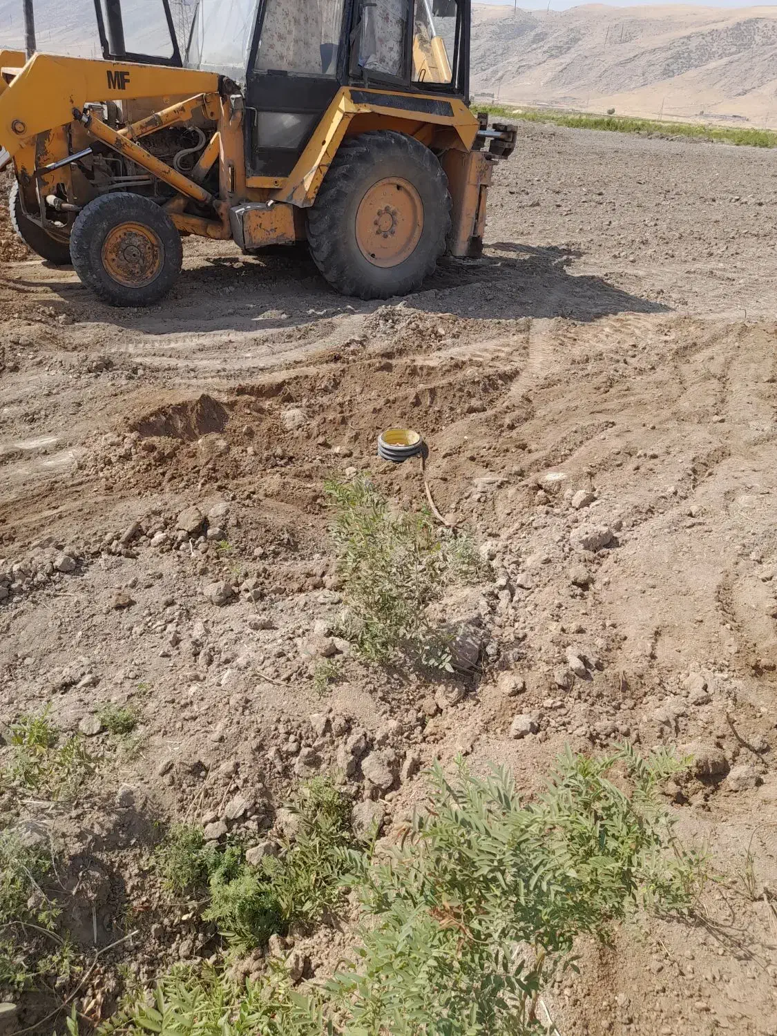 بیل بکهو|خودرو سنگین|گهواره, |دیوار