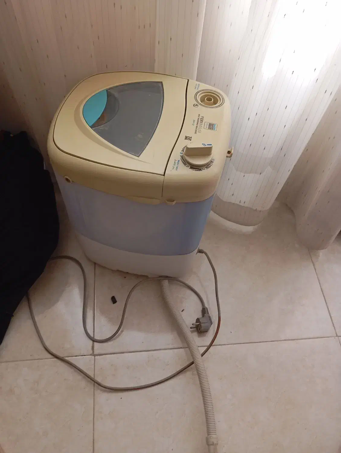 لباسشویی یا کهنه شور|ماشین لباسشویی و خشک‌کن لباس|همدان, |دیوار