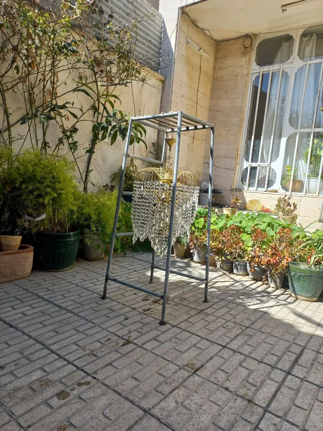 لوستر|لوستر و چراغ آویز|شیراز, میرزاکوچک خان|دیوار