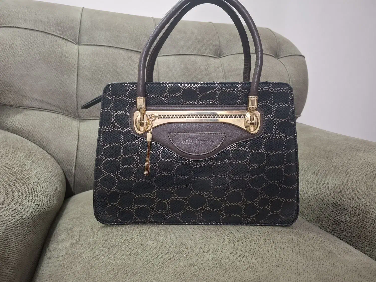 تعدادی کیف زنانه|کیف، کفش، کمربند|شیروان (خراسان), |دیوار