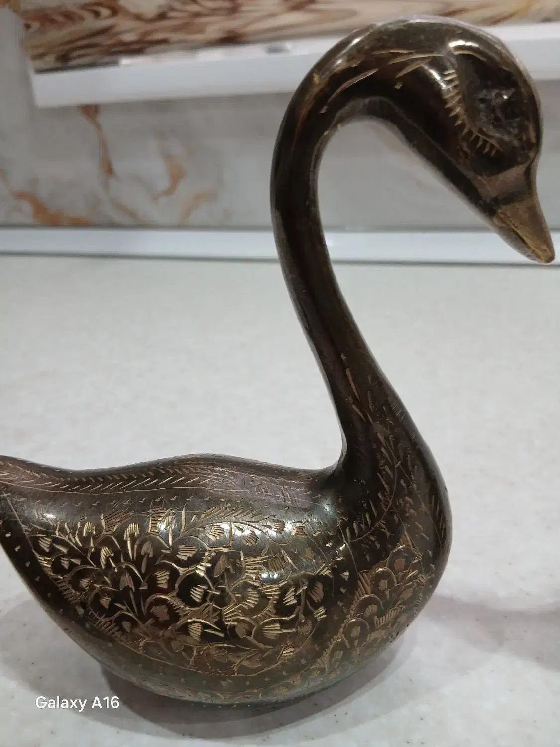 قوی عاشق برنزی|مجسمه، تندیس، ماکت|رباط‌کریم, نصیرشهر|دیوار