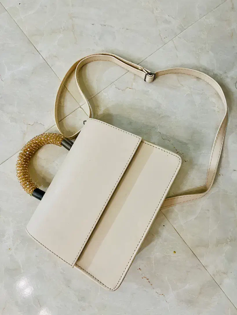 کیف مجلسی|کیف، کفش، کمربند|کاشان, آیت الله سعیدی|دیوار