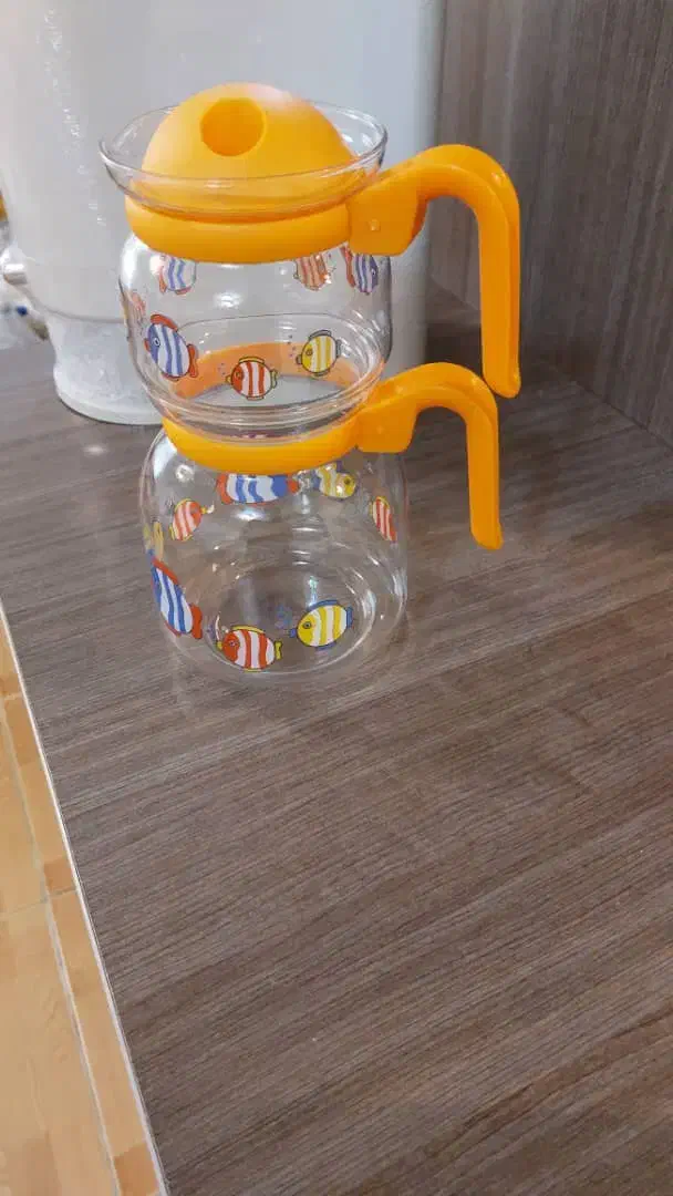 کتری قوری پیرکس روی گازی با شعله پخش کن|قوری، کتری، قهوه‌ساز دستی|رشت, لاکانی|دیوار