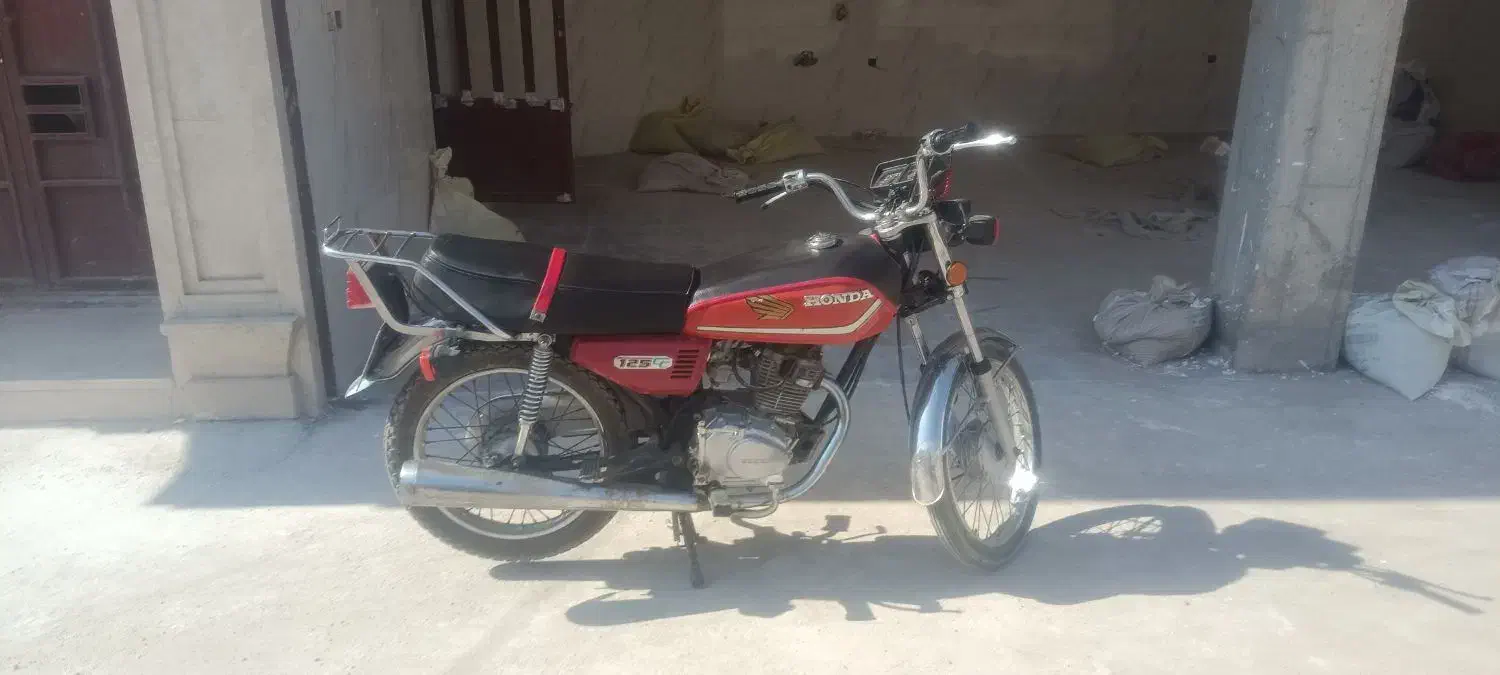موتور هندا 125|موتورسیکلت|زارچ, |دیوار