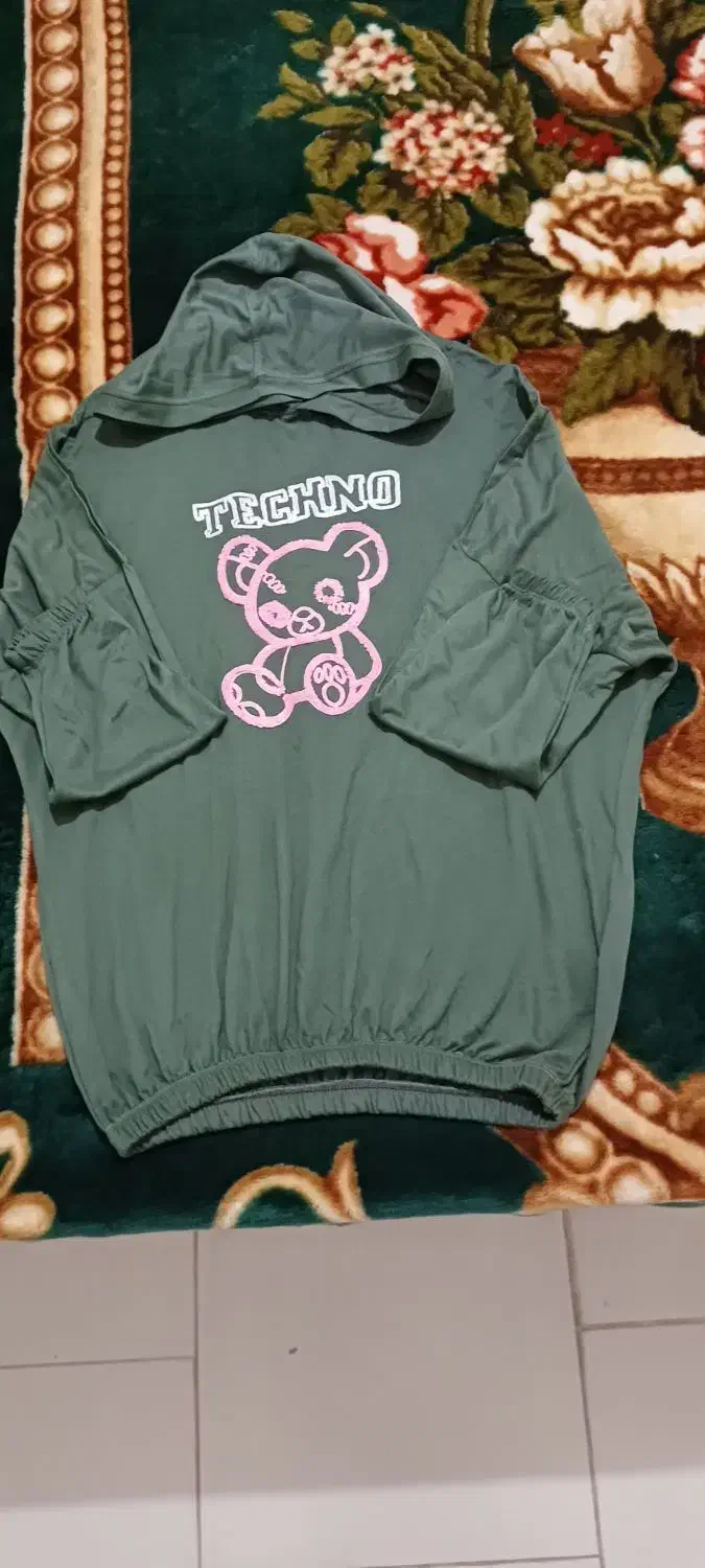 هودی کلاه دار|لباس|قدس, شهرقدس|دیوار