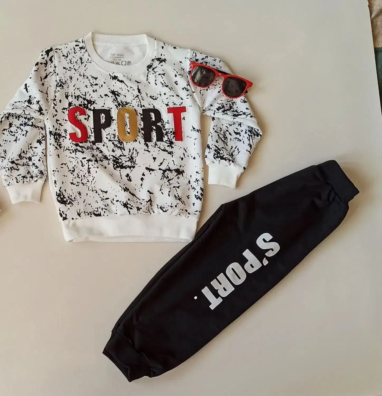 لباس بچگانه|کفش و لباس بچه|ماکو, |دیوار