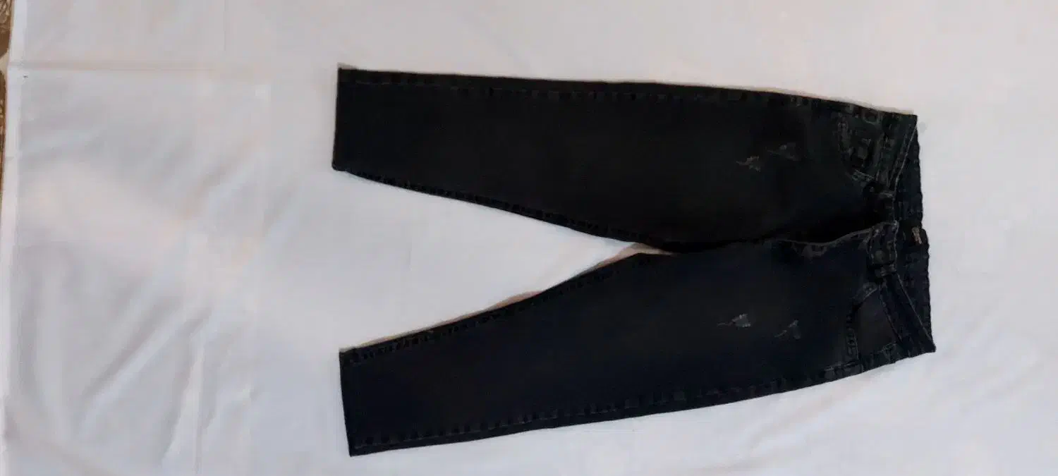 شلوار لی نو نو|لباس|قدس, شهر‌قدس|دیوار