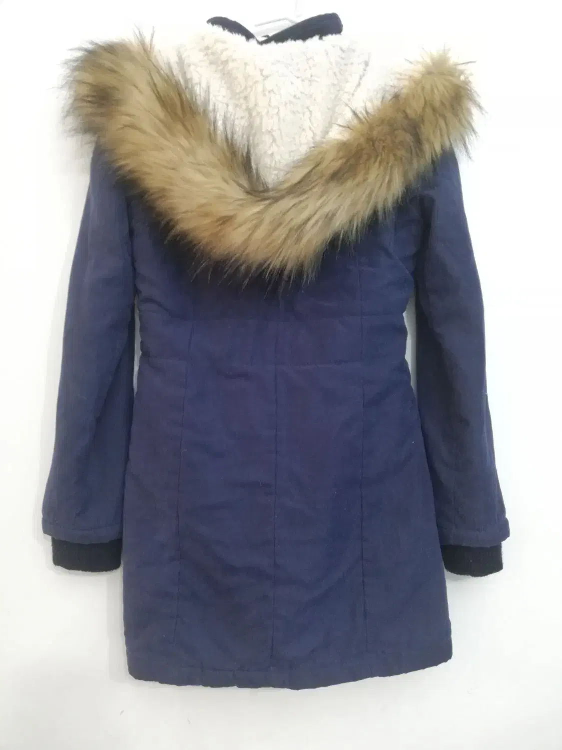 کاپشن|لباس|قم, بنیاد|دیوار