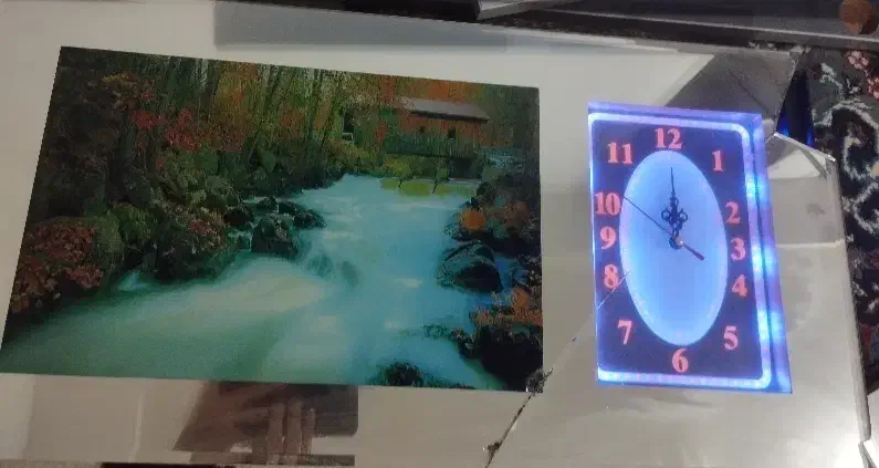 ساعت دیواری با تصویر نوری زیبا و صدای دلنشین|ساعت دیواری و تزئینی|اندیمشک, |دیوار