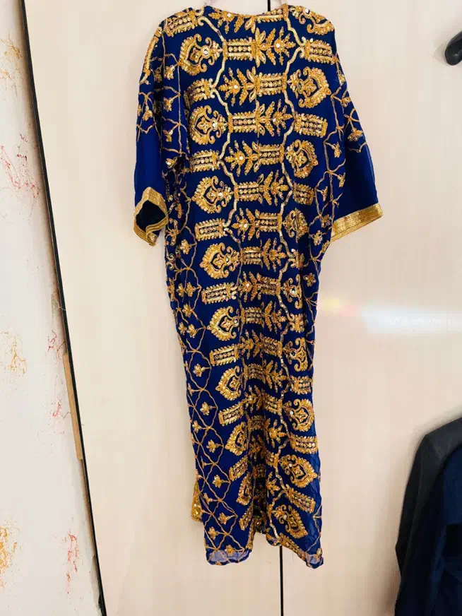 کفتان|لباس|مسجد سلیمان, |دیوار