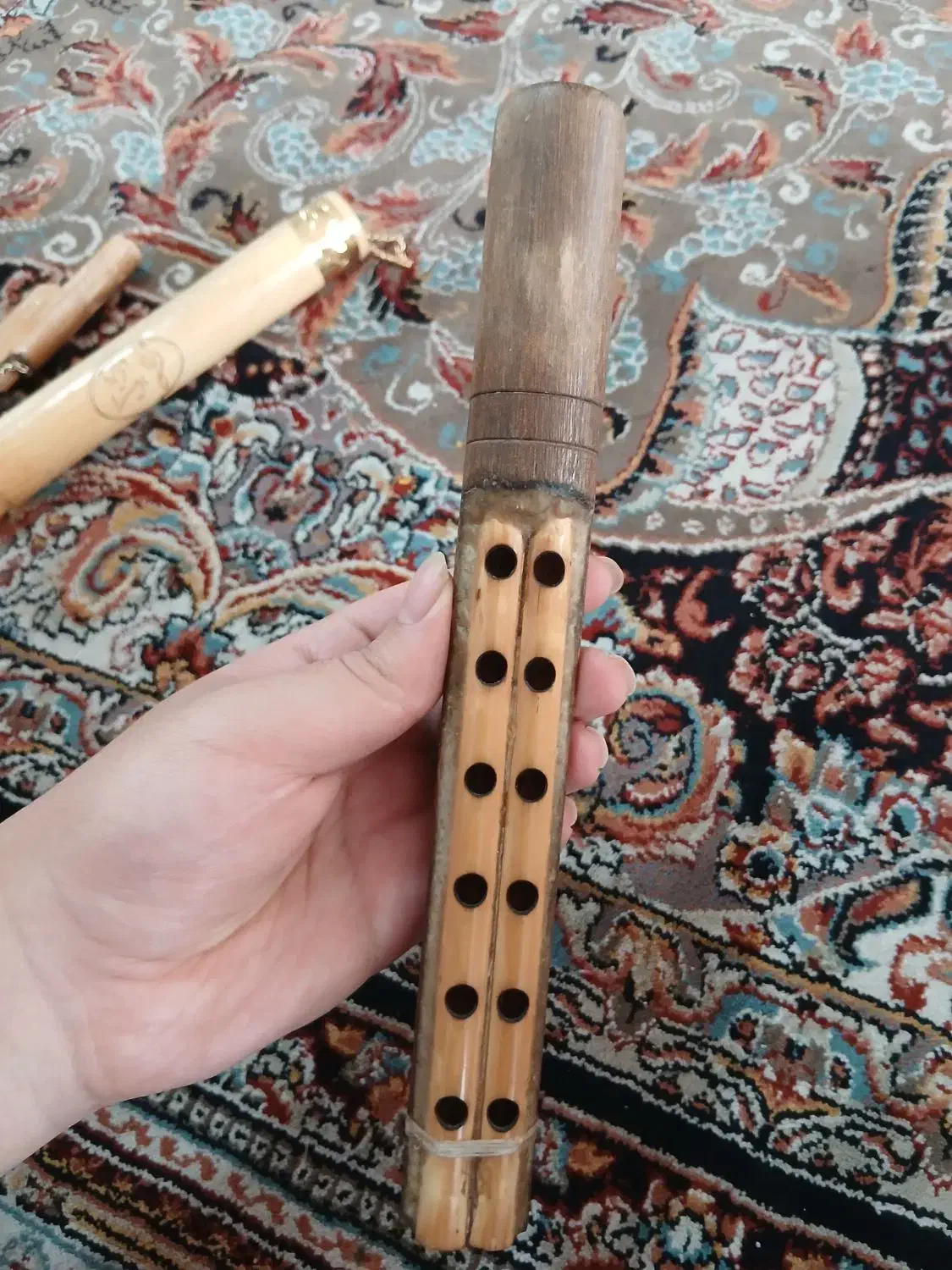 آلات موسیقی نی بوشهری|سازهای بادی|شیراز, پودنک|دیوار