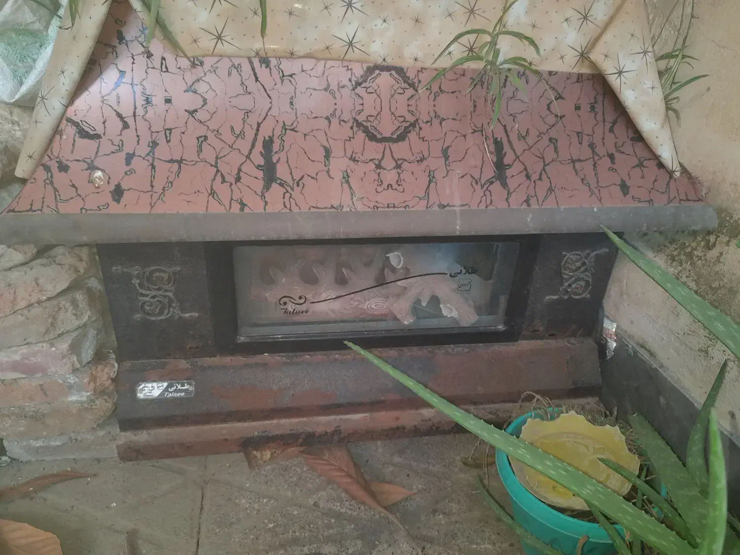 بخاری شومینه ای .|بخاری، هیتر، شومینه|کلاله, |دیوار