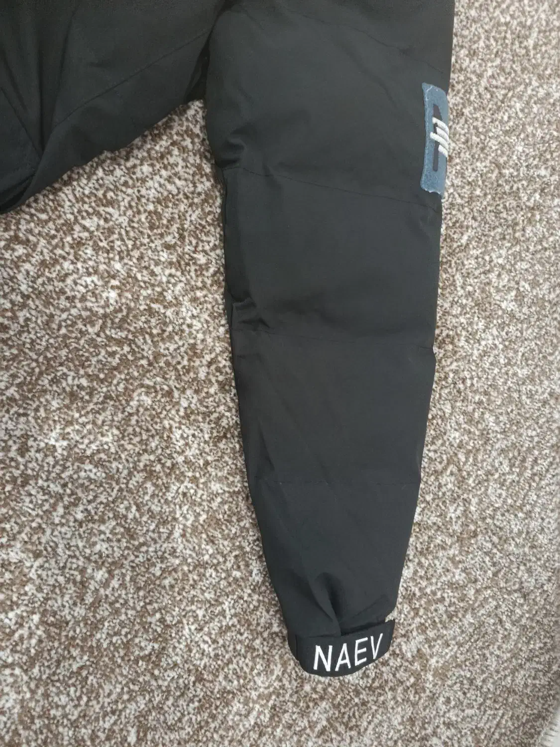 کاپشن|لباس|خورموج, |دیوار