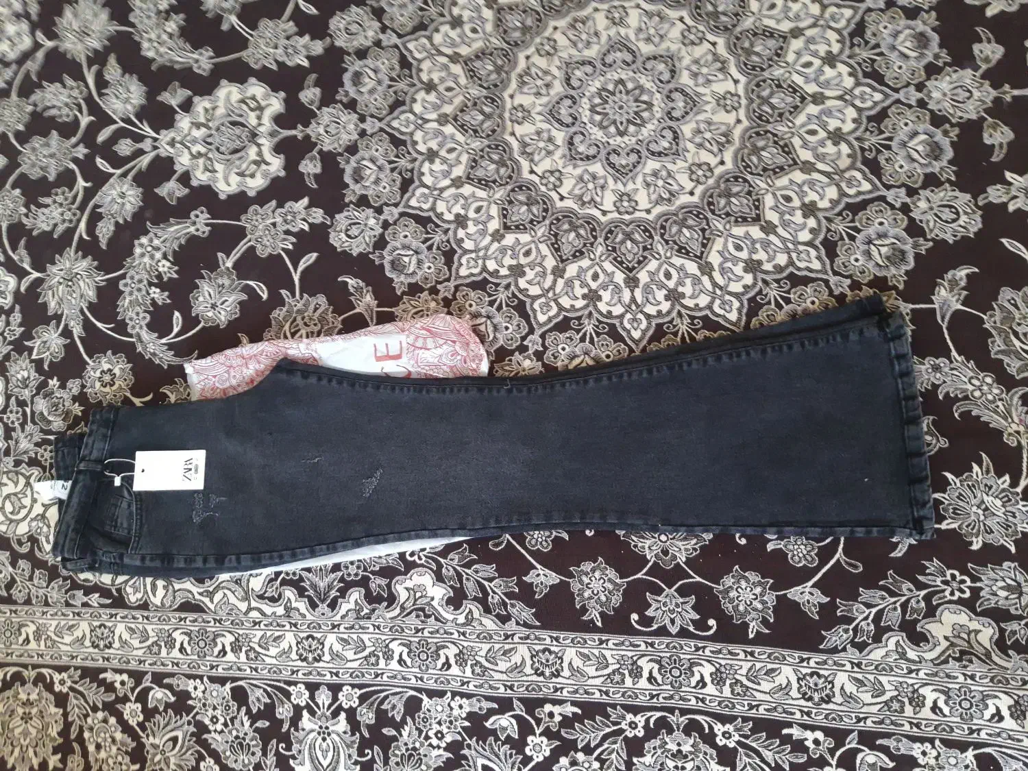 شلوار جین|لباس|شیراز, بعثت|دیوار