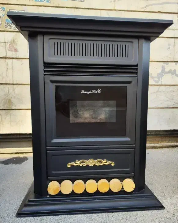 بخاری ( مدل طاووس طلایی ) رویه فلزی سیاه|بخاری، هیتر، شومینه|تبریز, |دیوار