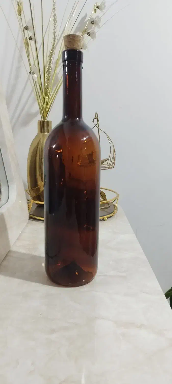 بطری شیشه ای یک لیتری در چوبی(پنبه دار)|ظروف نگهدارنده، پلاستیکی، یکبارمصرف|اهواز, سیصد دستگاه|دیوار