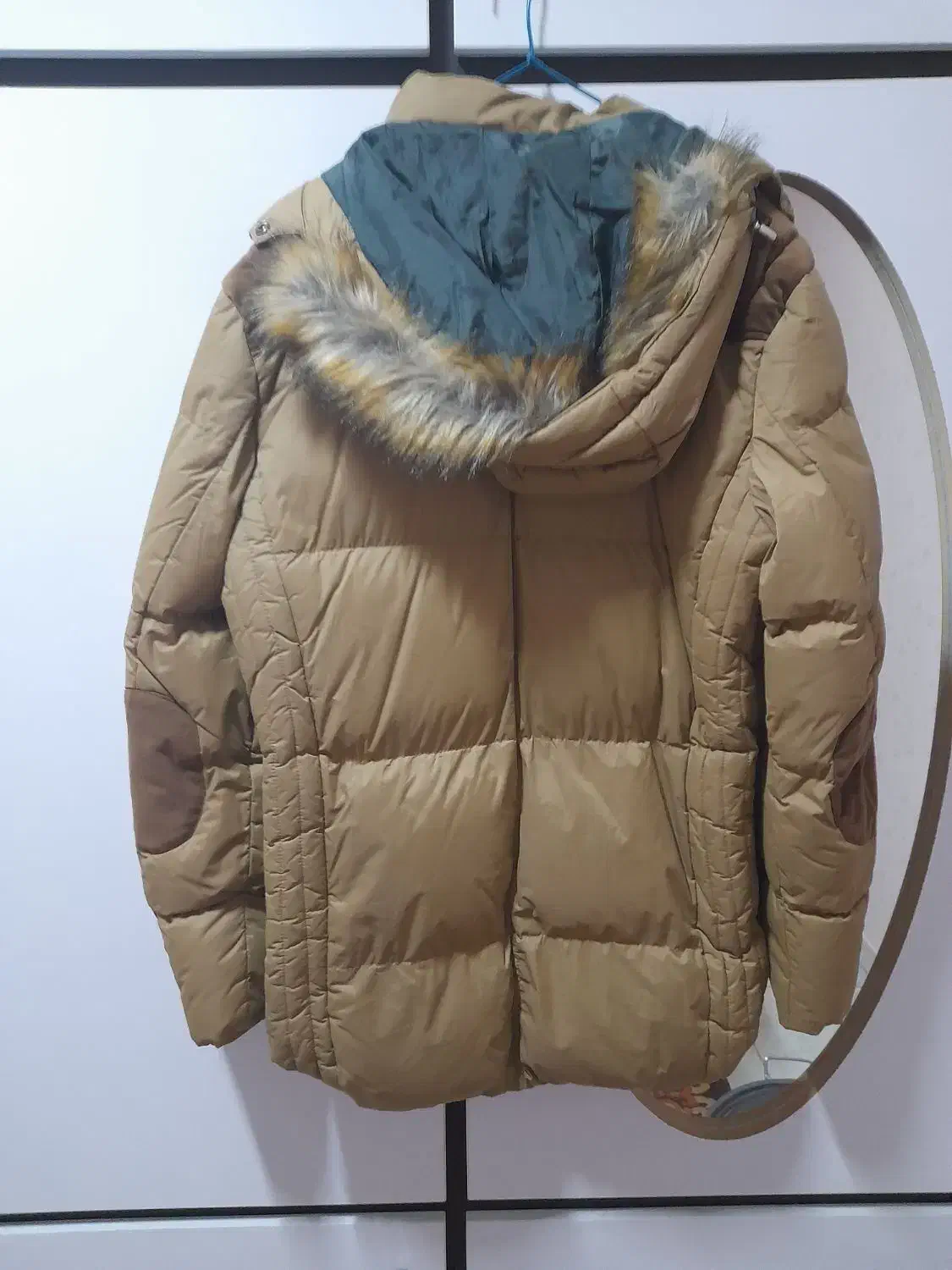 کاپشن|لباس|ایلام, |دیوار