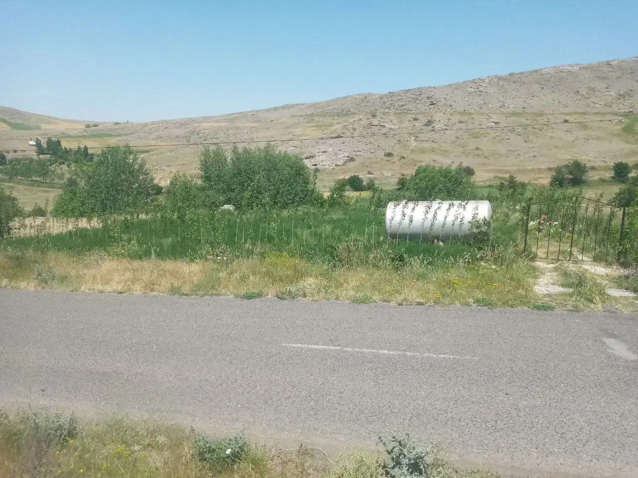 فروش باغ بر جاده میرزانق|فروش زمین و ملک کلنگی|عنبران, |دیوار