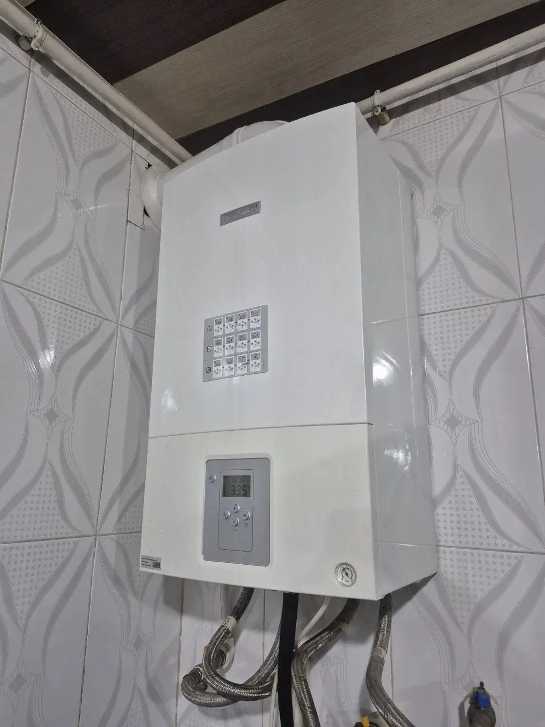 تعمیر و سرویس و نصب پکیج آبگرمکن دیواری|خدمات پیشه و مهارت|بیجار, |دیوار